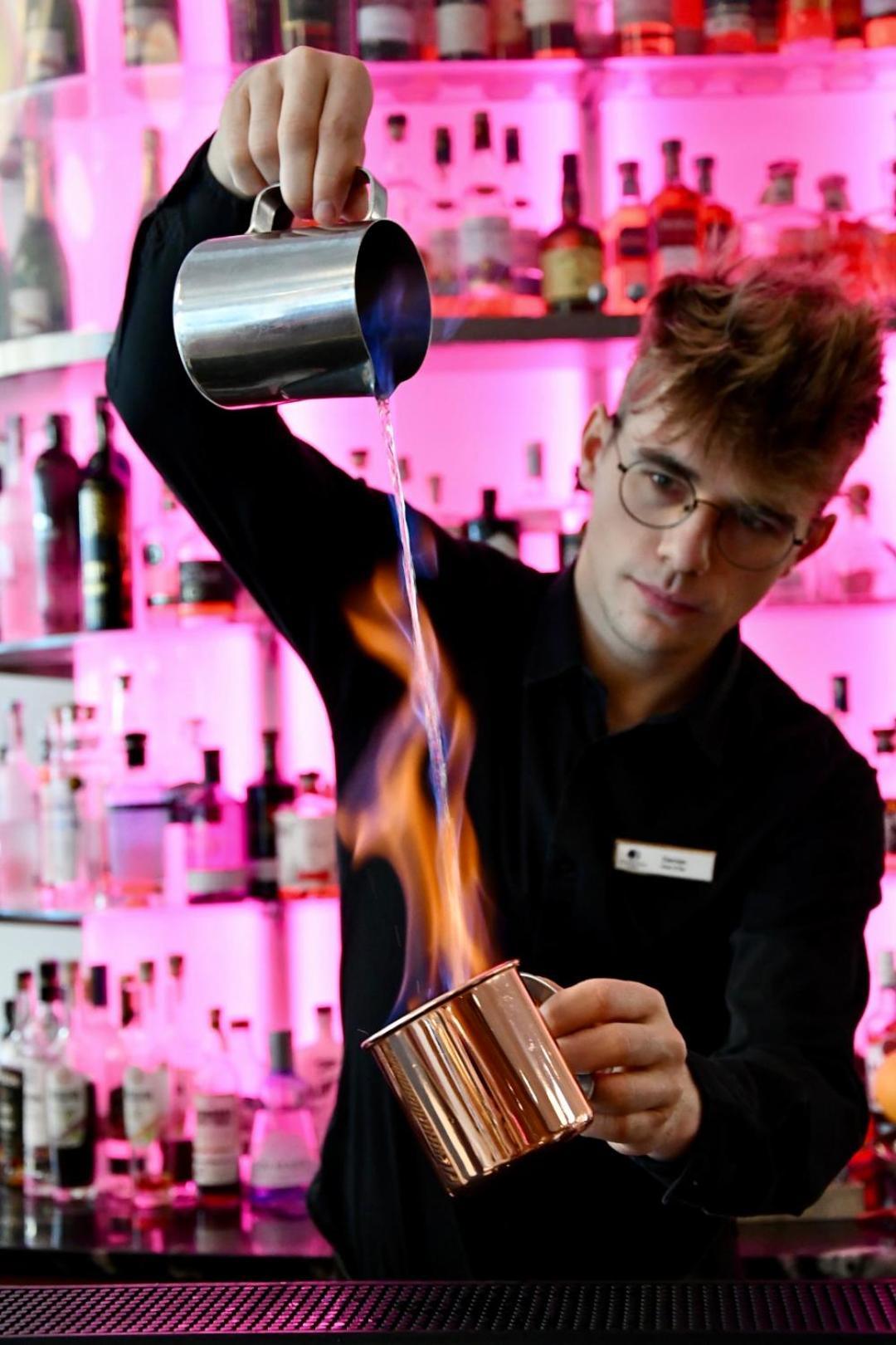 Doubletree By Hilton Wroclaw Hotel Exterior photo A bartender at work