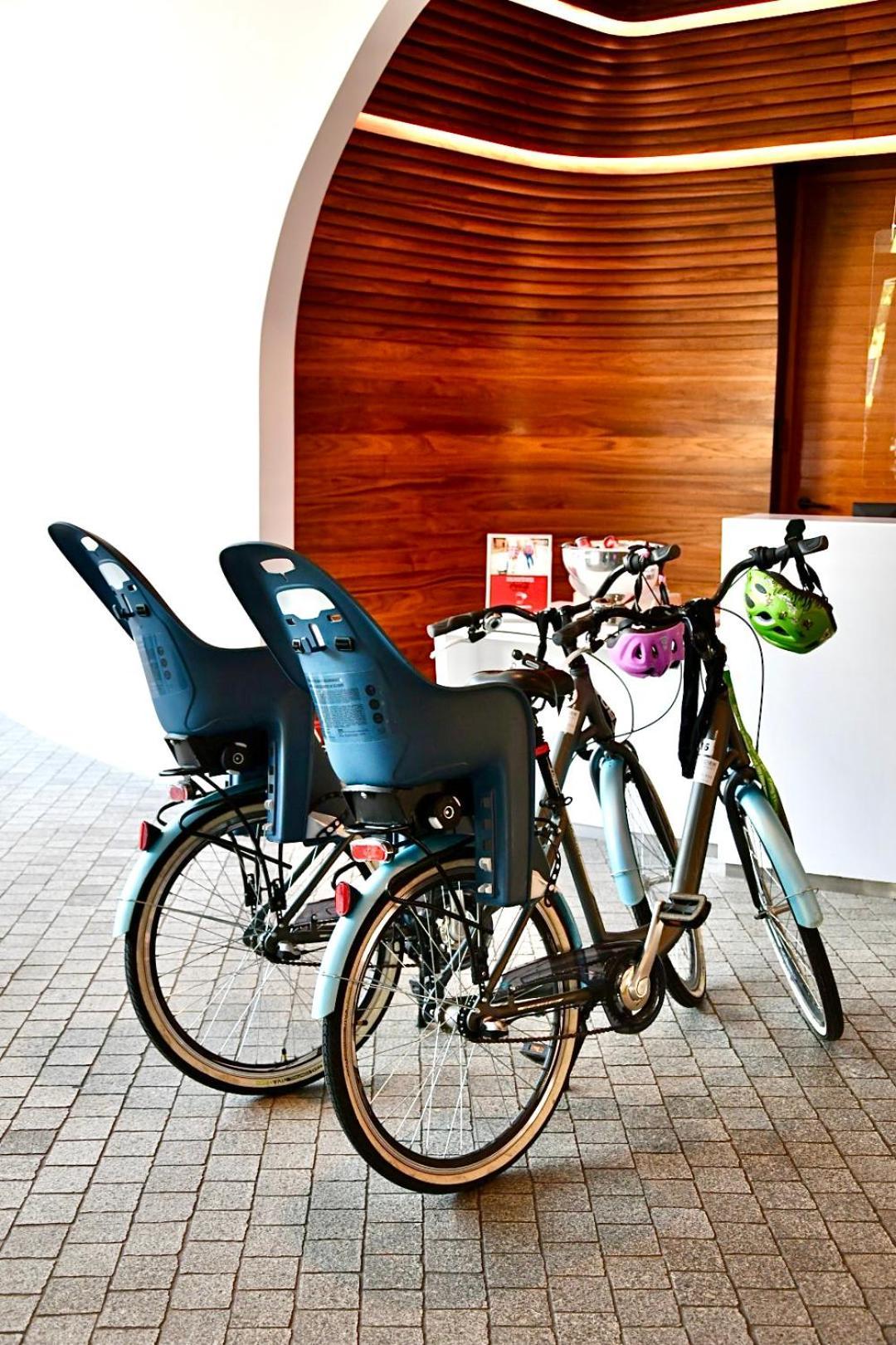 Doubletree By Hilton Wroclaw Hotel Exterior photo Child seats on bicycles